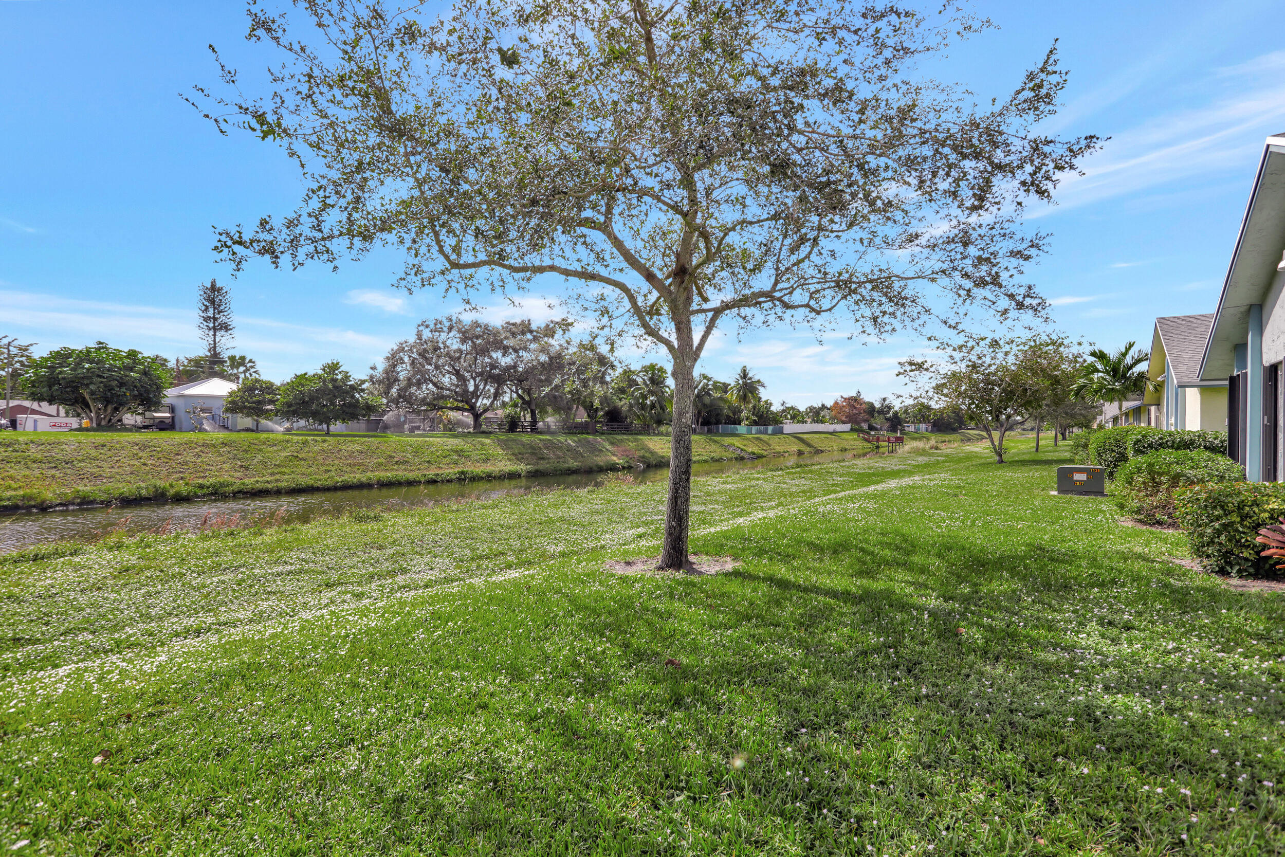 9142 Southwest 22nd Street, Unit E Boca Raton, FL 33428 - Photo 30 of 51 a view of a park with large trees