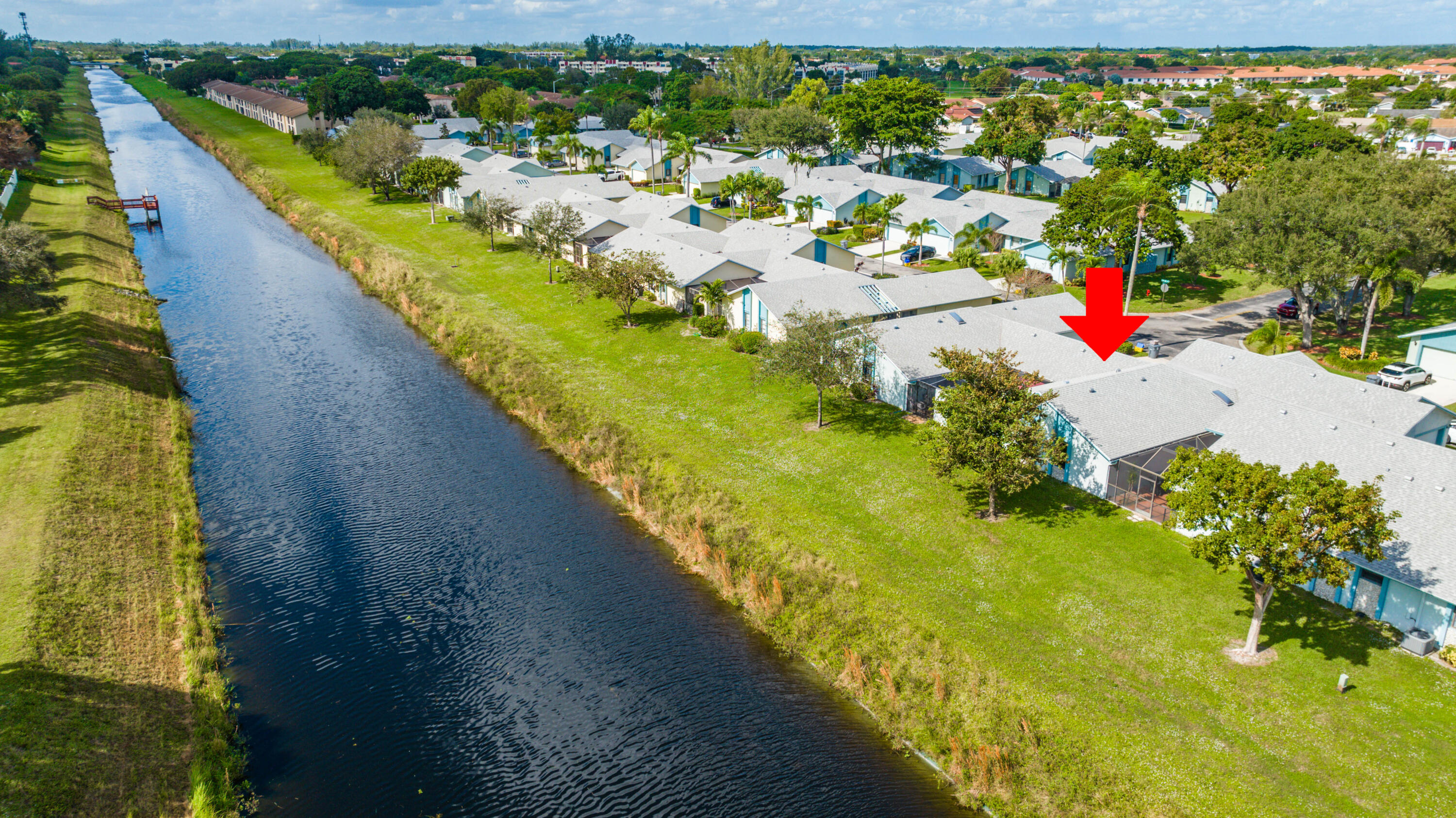 9142 Southwest 22nd Street, Unit E Boca Raton, FL 33428 - Photo 33 of 51 a view of a lake with outdoor space