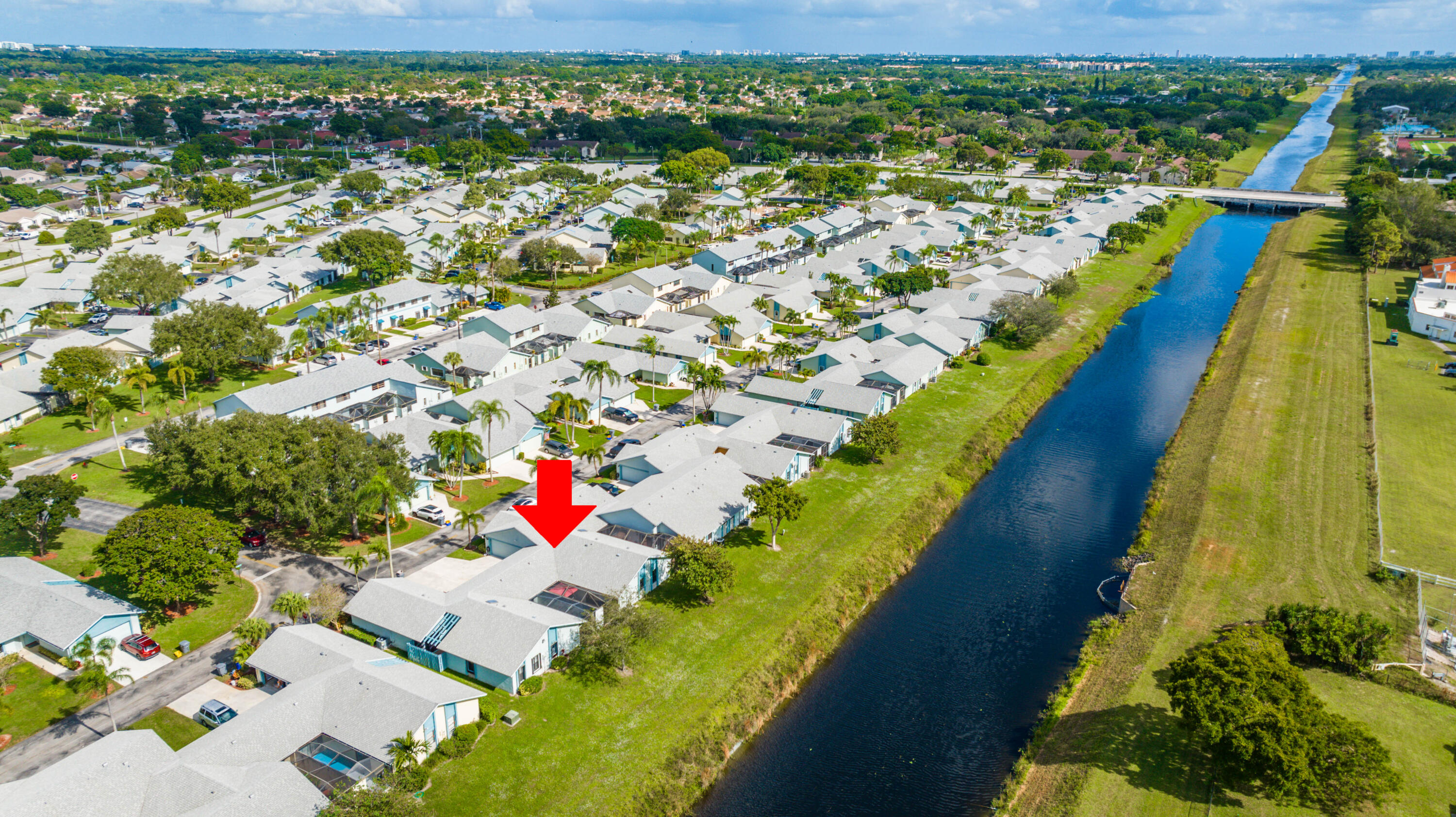 9142 Southwest 22nd Street, Unit E Boca Raton, FL 33428 - Photo 35 of 51 an aerial view of residential houses with outdoor space