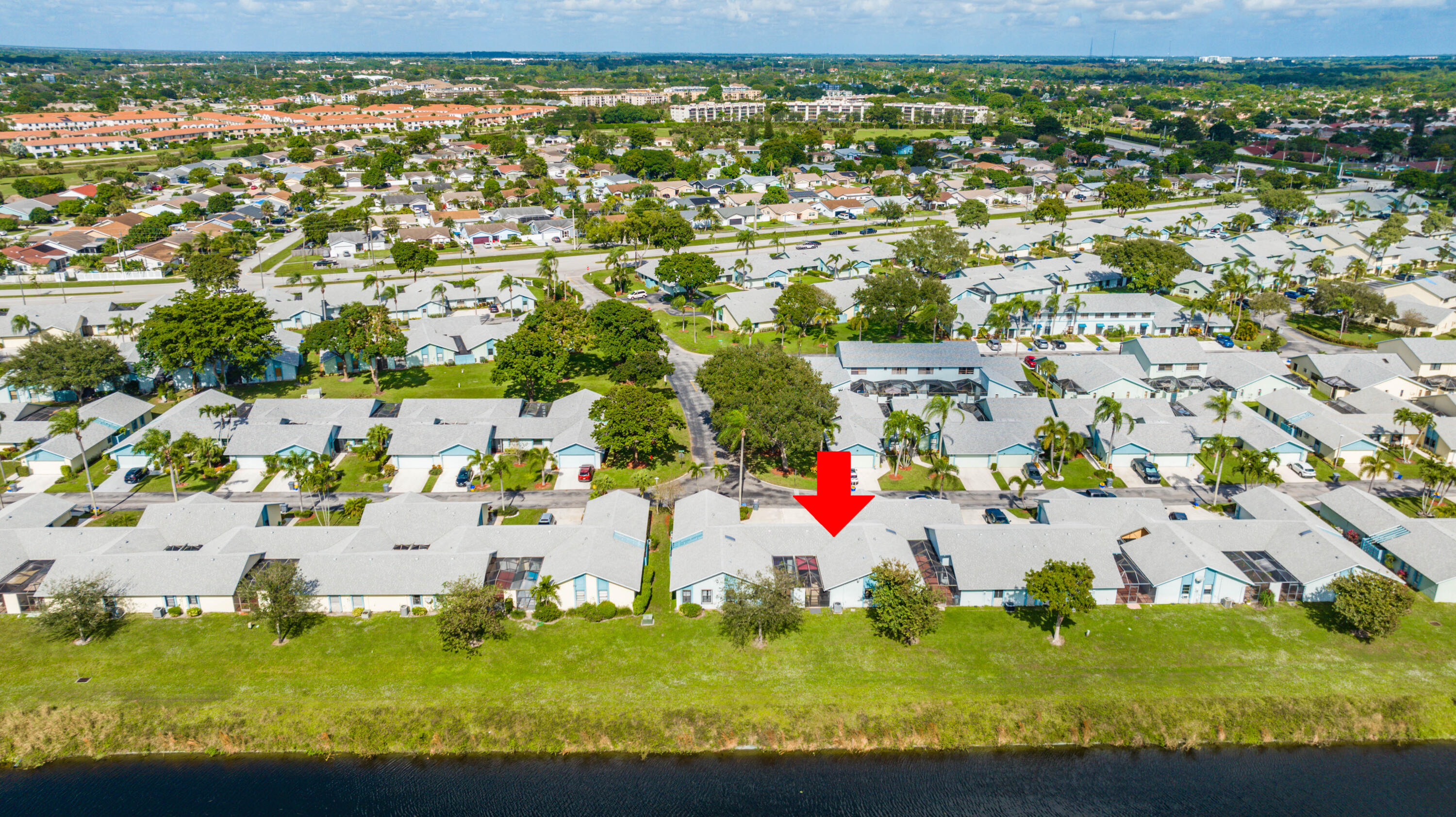 9142 Southwest 22nd Street, Unit E Boca Raton, FL 33428 - Photo 36 of 51 an aerial view of residential houses with outdoor space