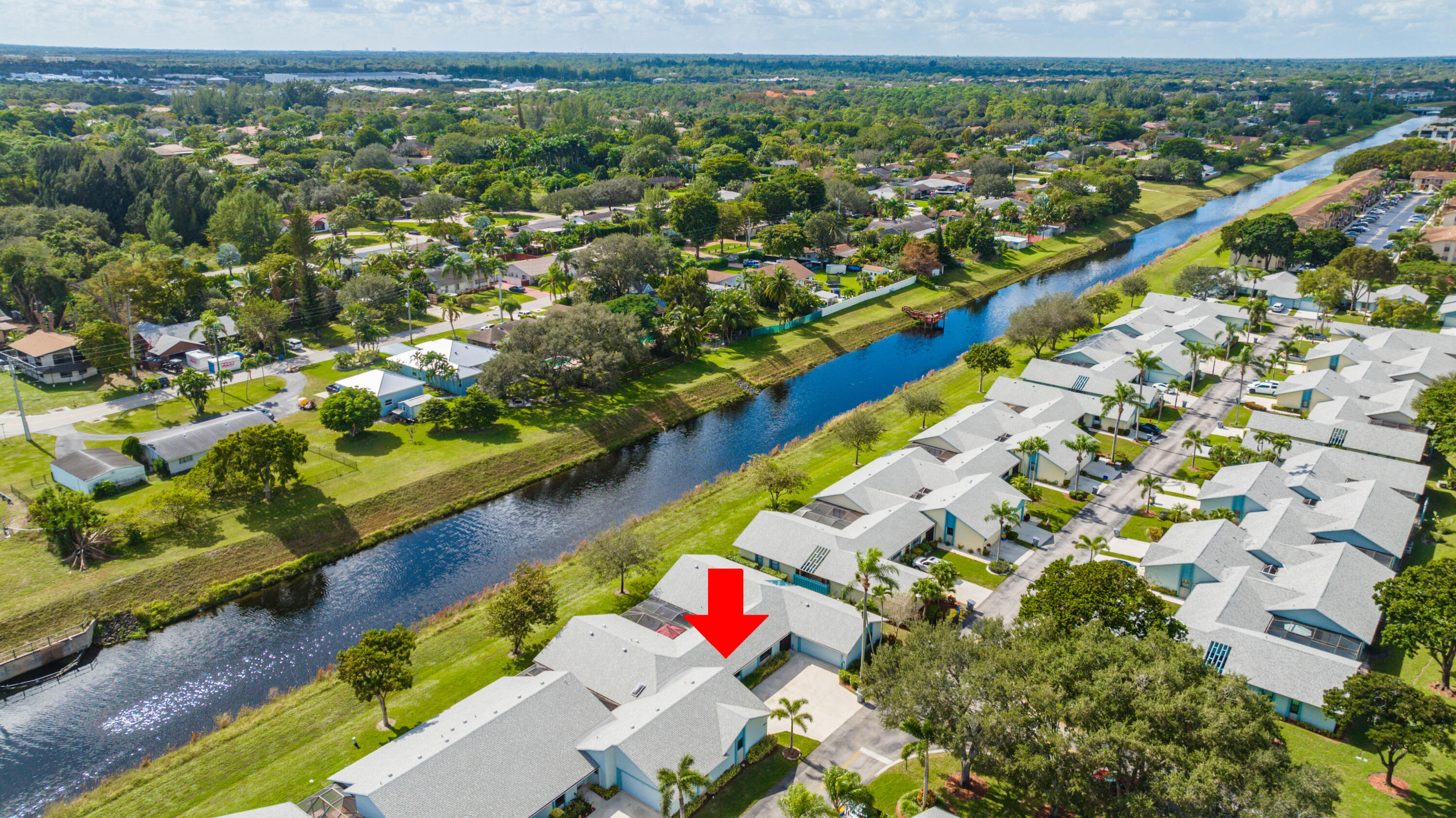 9142 Southwest 22nd Street, Unit E Boca Raton, FL 33428 - Photo 38 of 51 an aerial view of residential houses with outdoor space