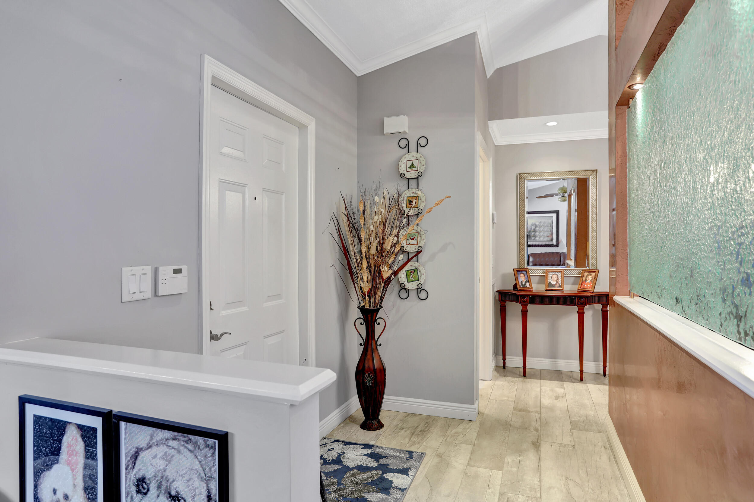 9142 Southwest 22nd Street, Unit E Boca Raton, FL 33428 - Photo 4 of 51 a living room with furniture and wooden floor