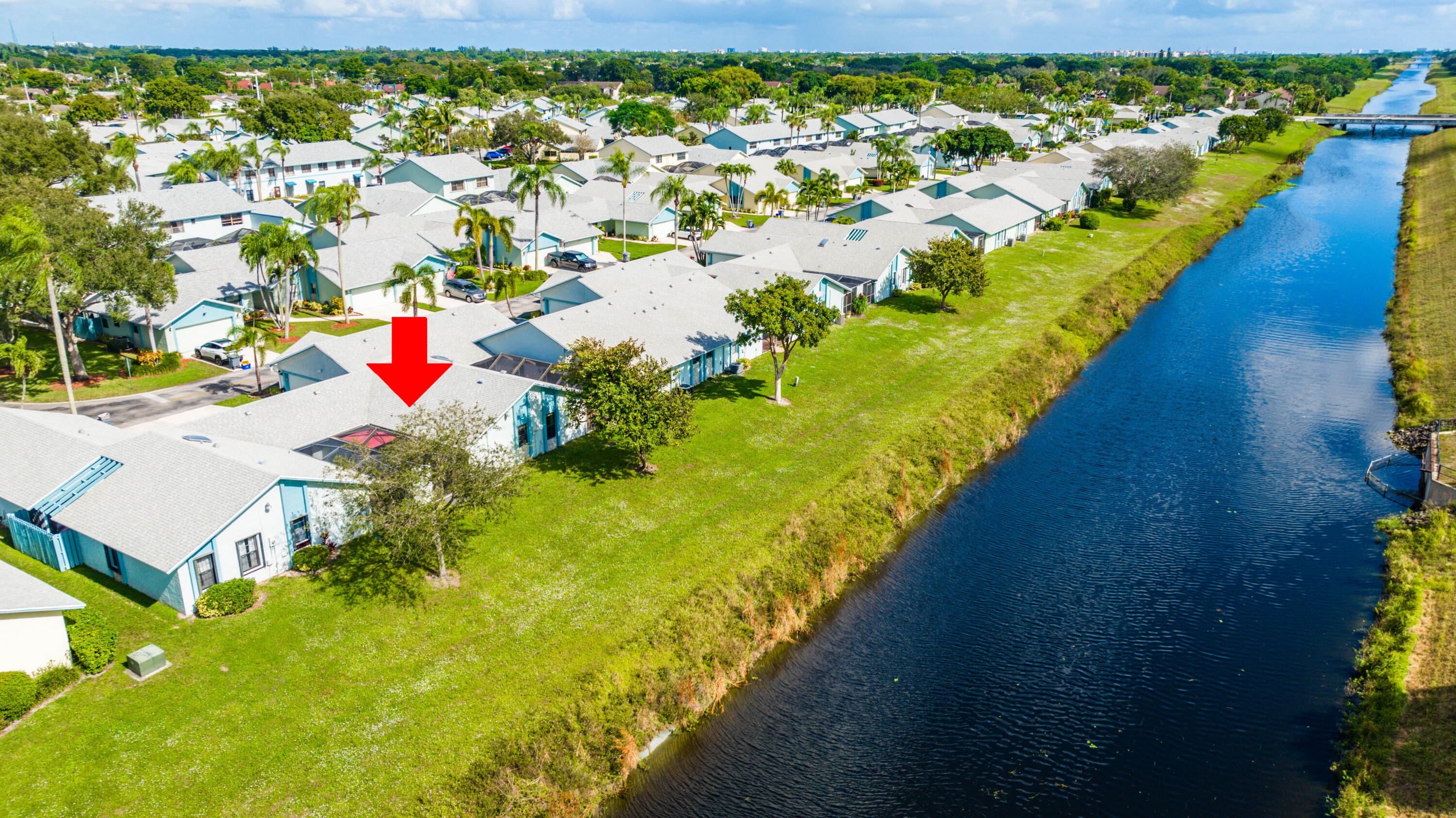 9142 Southwest 22nd Street, Unit E Boca Raton, FL 33428 - Photo 43 of 51 a view of a lake with houses