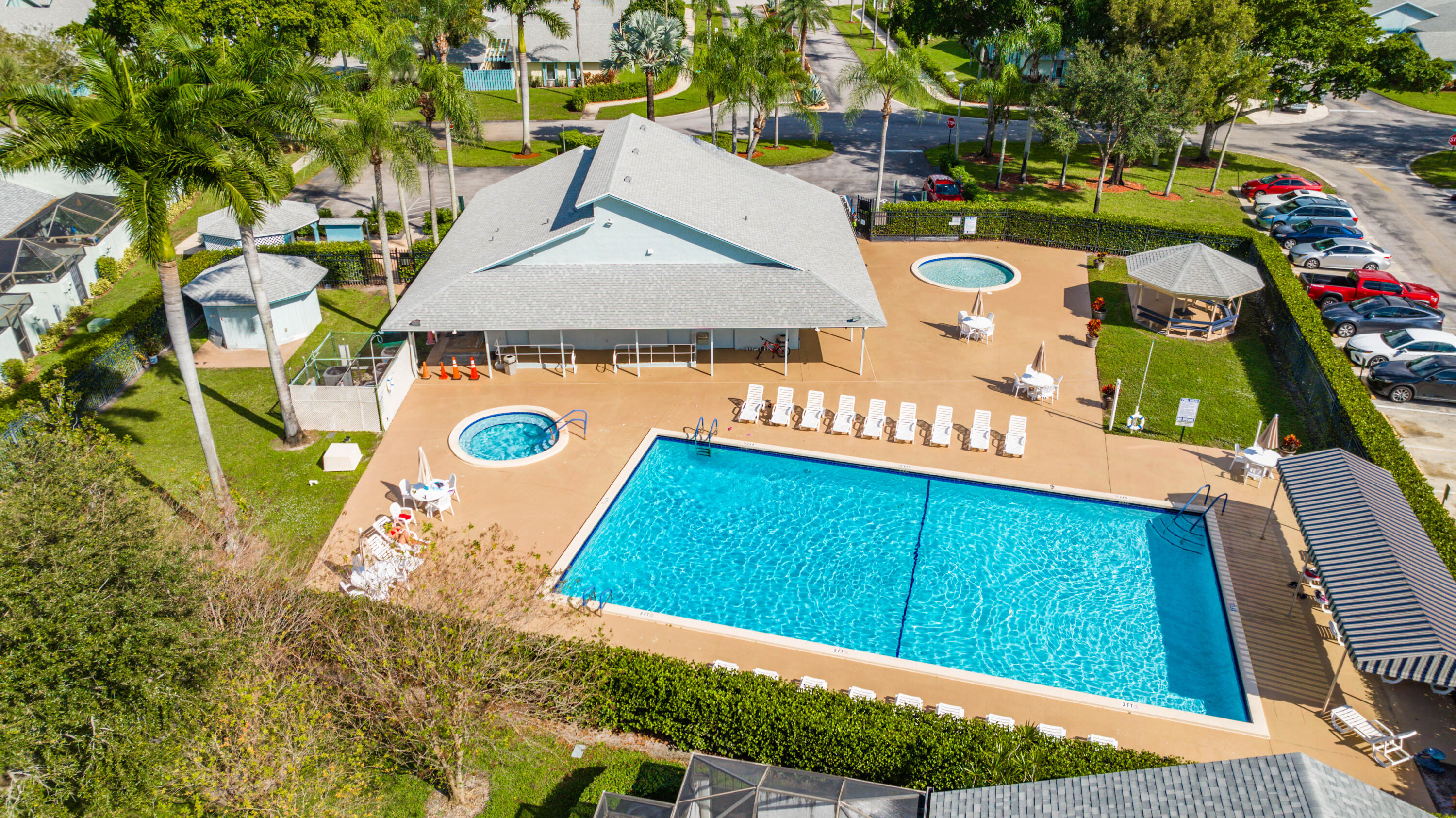 9142 Southwest 22nd Street, Unit E Boca Raton, FL 33428 - Photo 46 of 51 swimming pool view with a sitting space