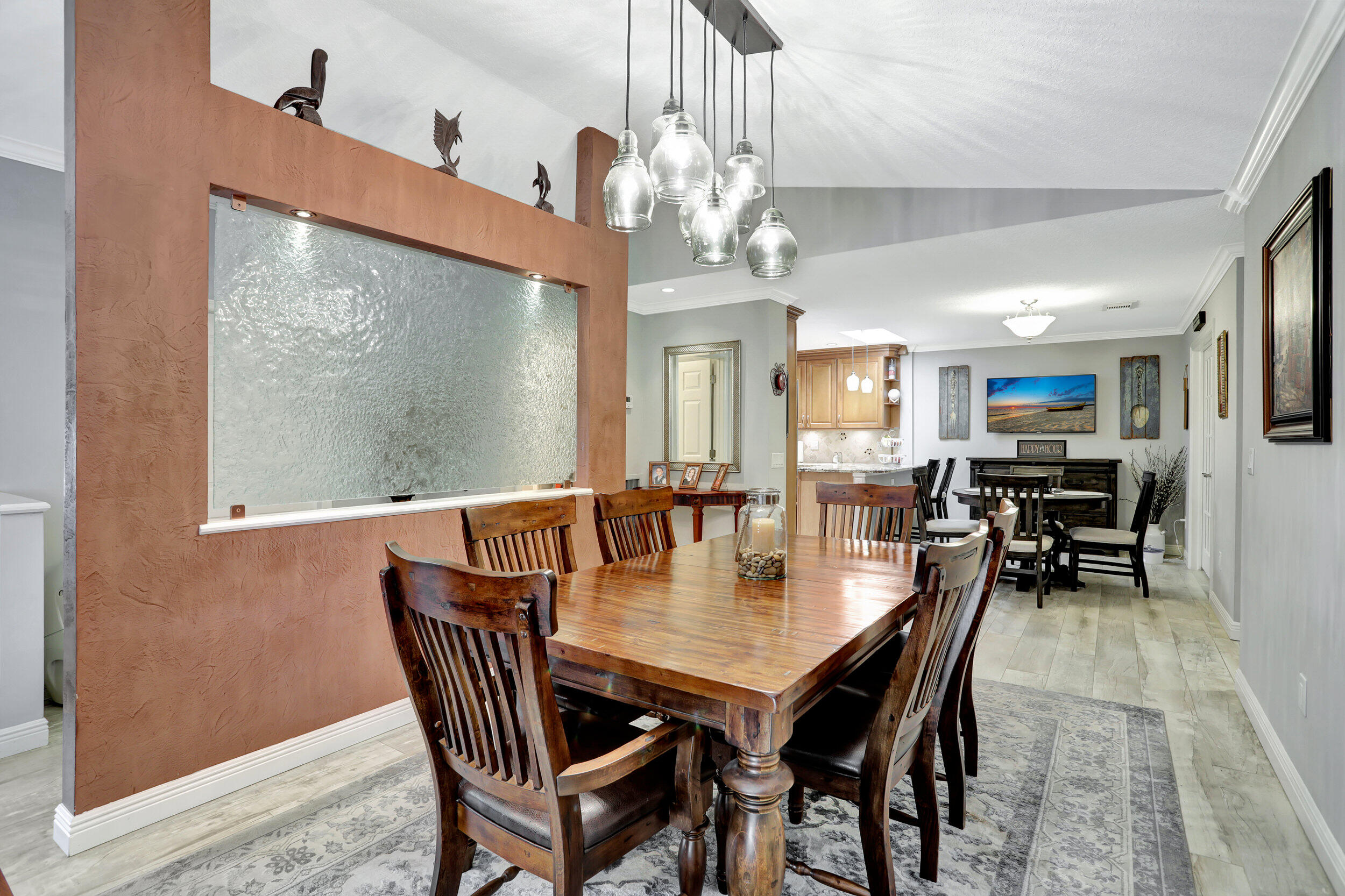 9142 Southwest 22nd Street, Unit E Boca Raton, FL 33428 - Photo 8 of 51 a view of a dining room with furniture and wooden floor