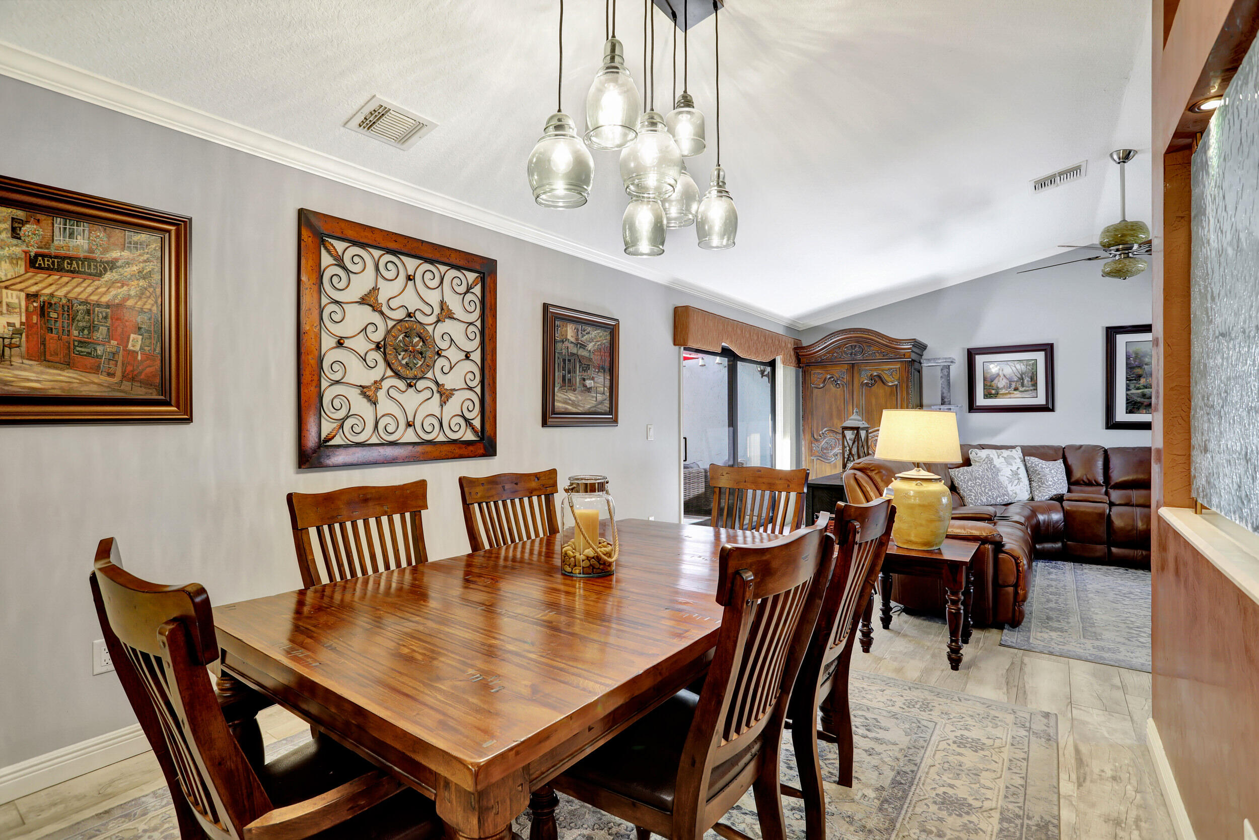 9142 Southwest 22nd Street, Unit E Boca Raton, FL 33428 - Photo 9 of 51 a view of a dining room with furniture