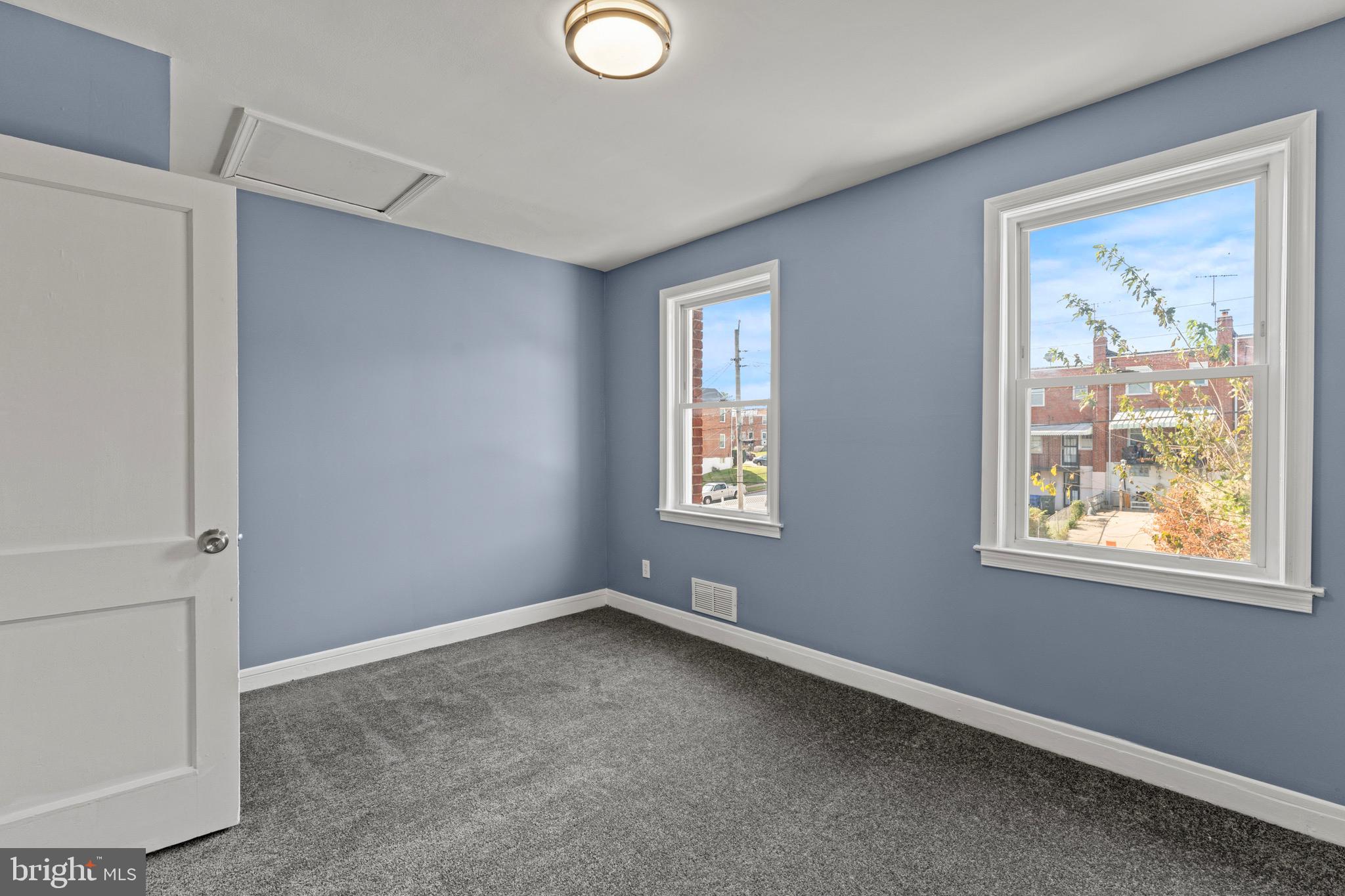 3693 Kenyon Avenue Baltimore, MD 21213 - Photo 15 of 34 an empty room with windows