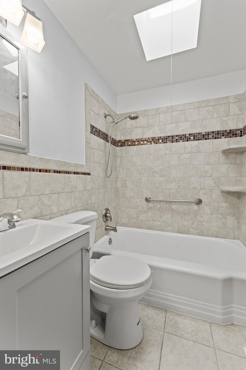 3693 Kenyon Avenue Baltimore, MD 21213 - Photo 18 of 34 a bathroom with a sink toilet and shower