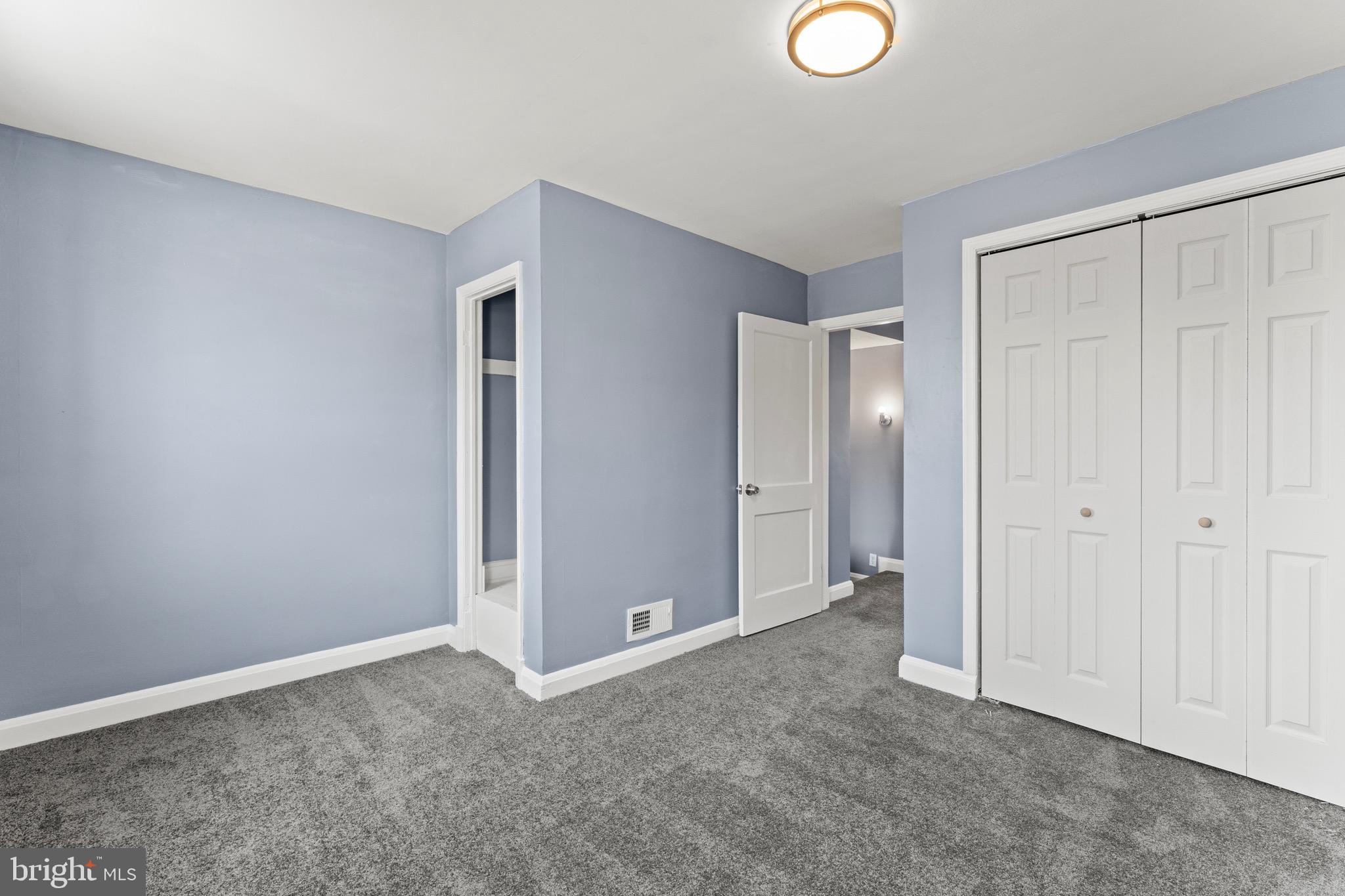 3693 Kenyon Avenue Baltimore, MD 21213 - Photo 21 of 34 a view of an empty room and window