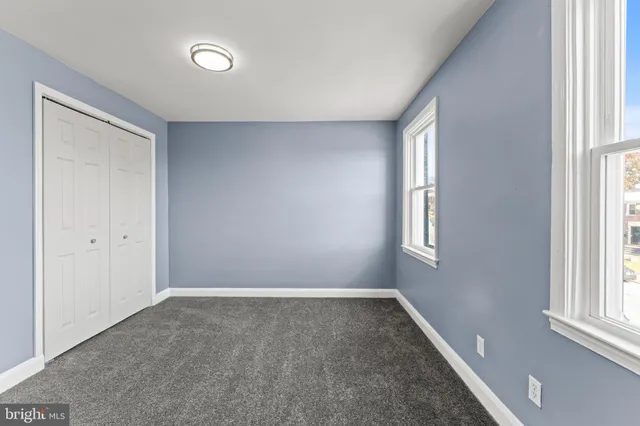 an empty room with windows