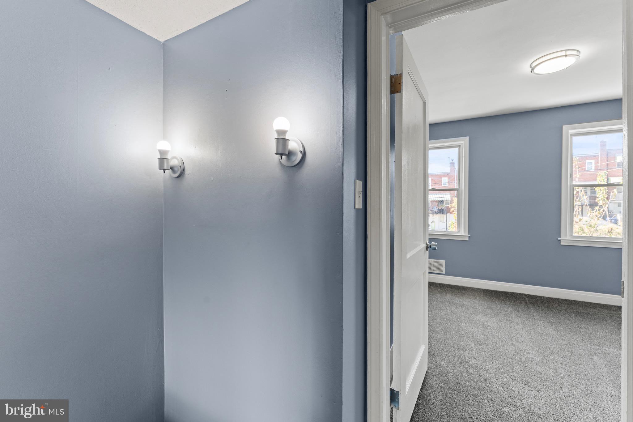 3693 Kenyon Avenue Baltimore, MD 21213 - Photo 24 of 34 an empty room with windows