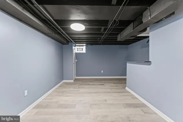 a view of a house with backyard porch and sitting area