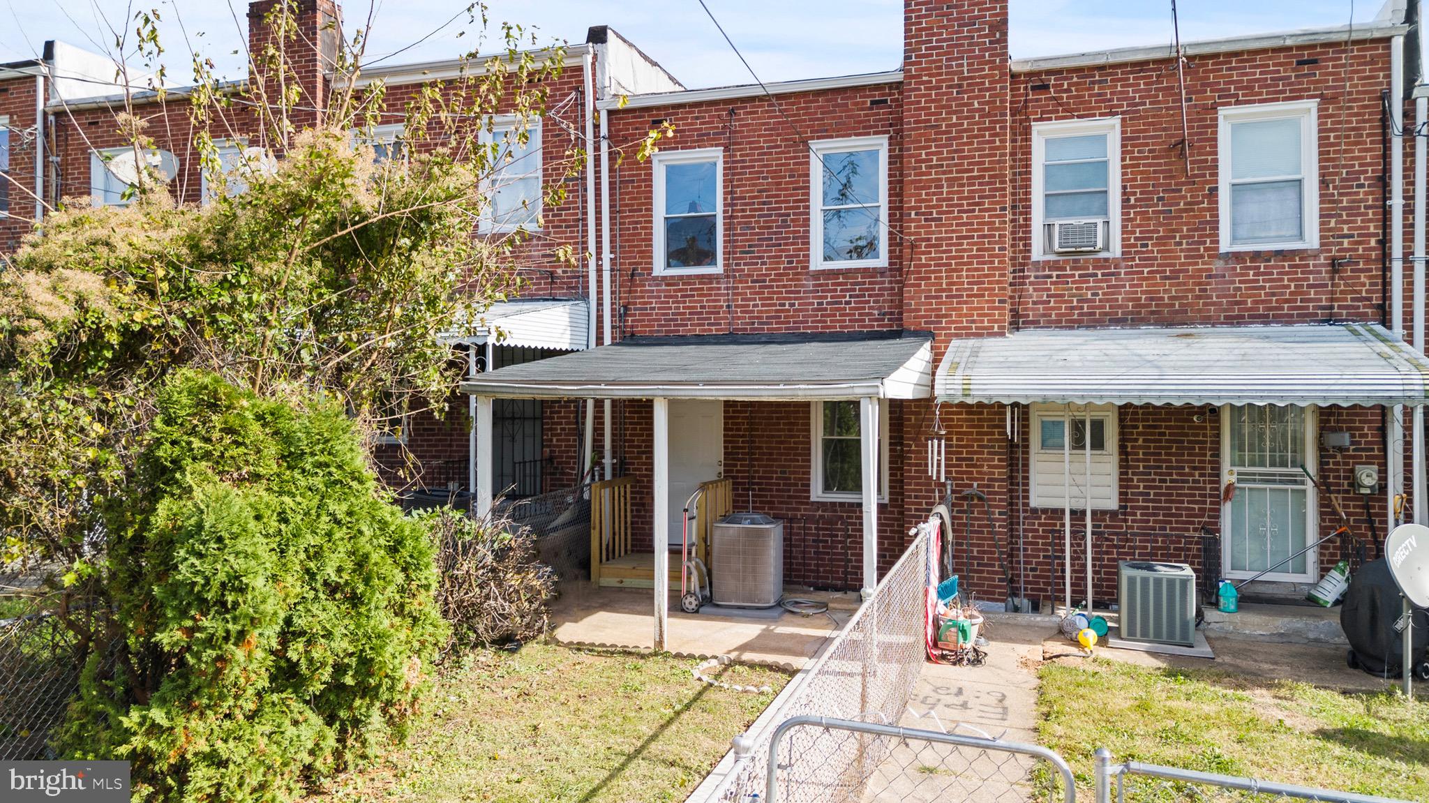 3693 Kenyon Avenue Baltimore, MD 21213 - Photo 30 of 34 a view of a house with backyard porch and sitting area