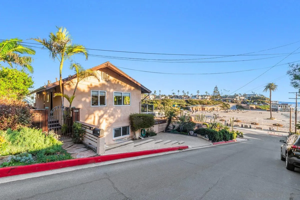 231 5th Street Encinitas, CA 92024 - Photo 2 of 43 a front view of a house with a yard