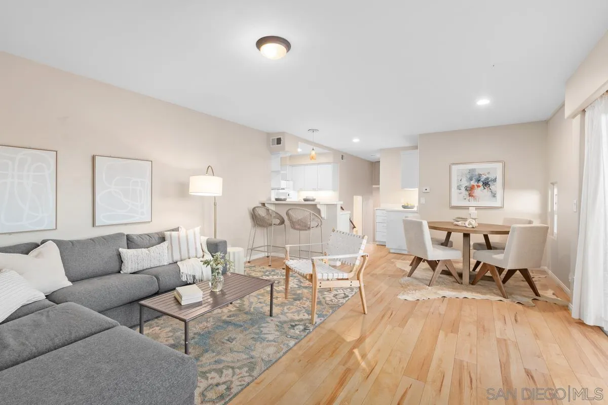 231 5th Street Encinitas, CA 92024 - Photo 30 of 43 a living room with furniture and a wooden floor