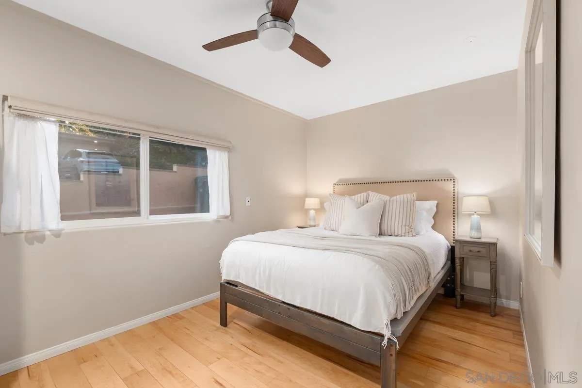 231 5th Street Encinitas, CA 92024 - Photo 31 of 43 a bedroom with a bed and window