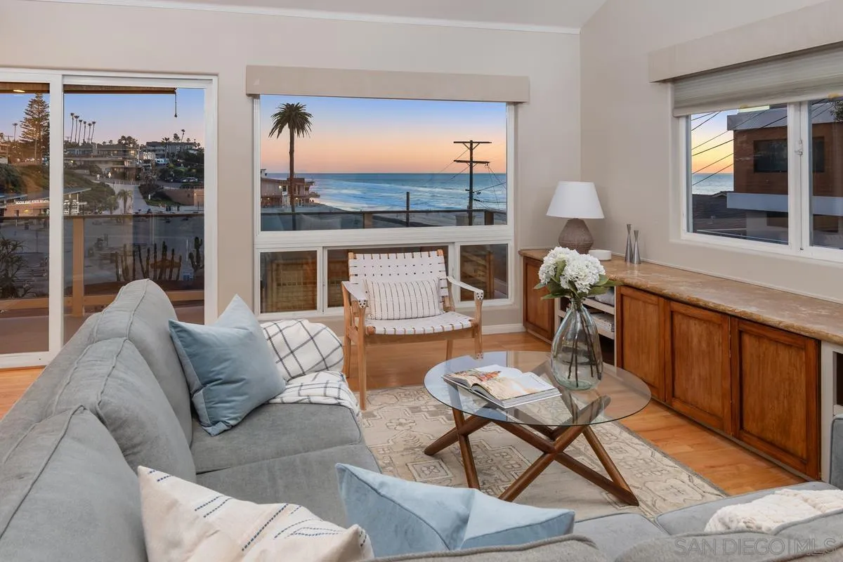 231 5th Street Encinitas, CA 92024 - Photo 38 of 43 a living room with furniture and a floor to ceiling window
