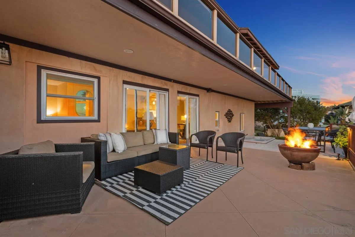 231 5th Street Encinitas, CA 92024 - Photo 40 of 43 a living room with furniture and a dining table