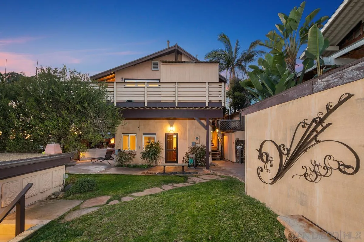 231 5th Street Encinitas, CA 92024 - Photo 41 of 43 a front view of a house with garden