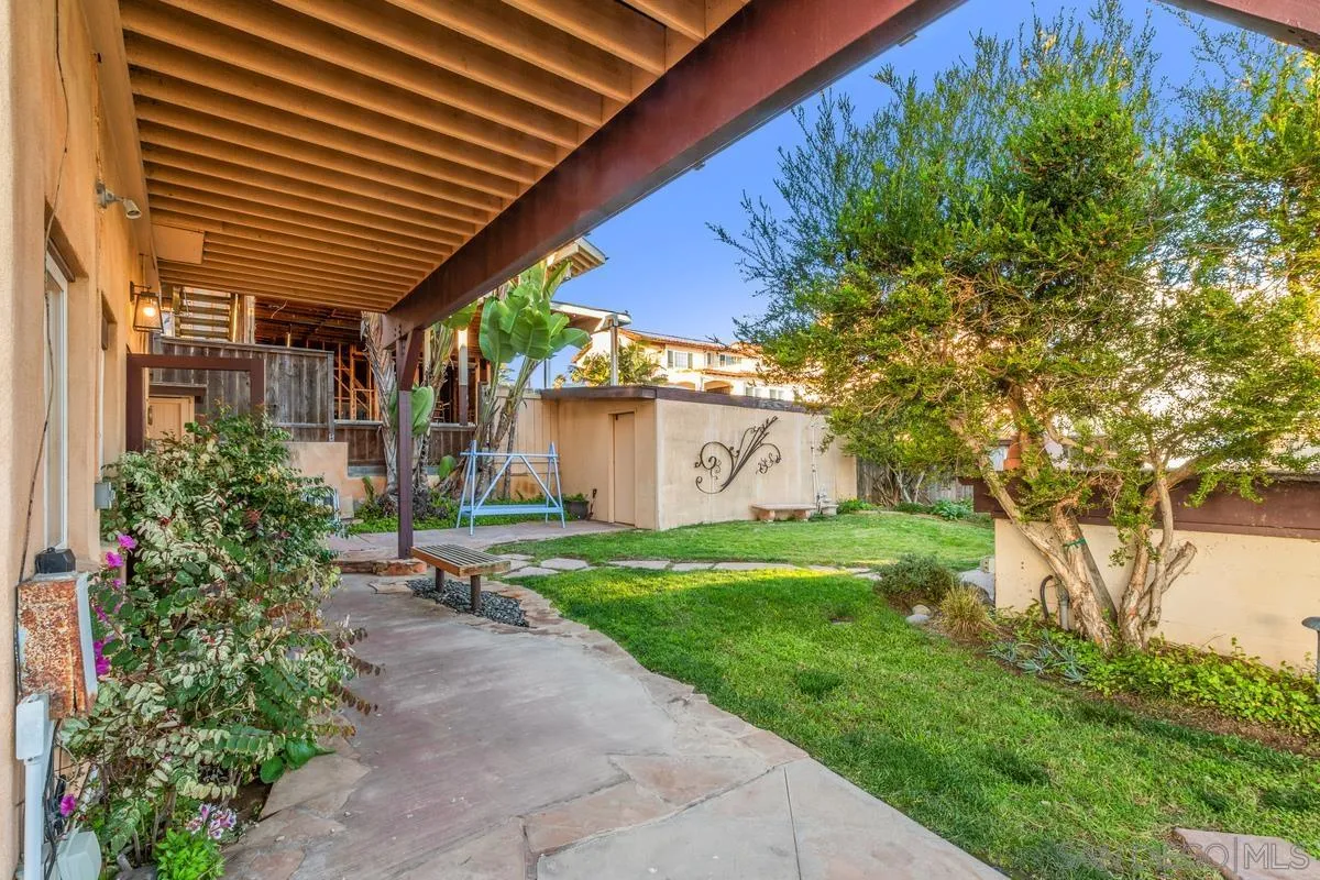 231 5th Street Encinitas, CA 92024 - Photo 7 of 43 a front view of a house with garden
