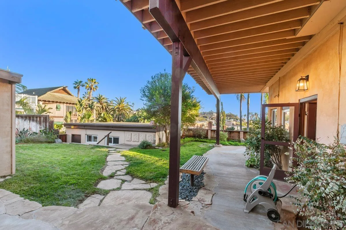 231 5th Street Encinitas, CA 92024 - Photo 8 of 43 a view of a porch with furniture and garden