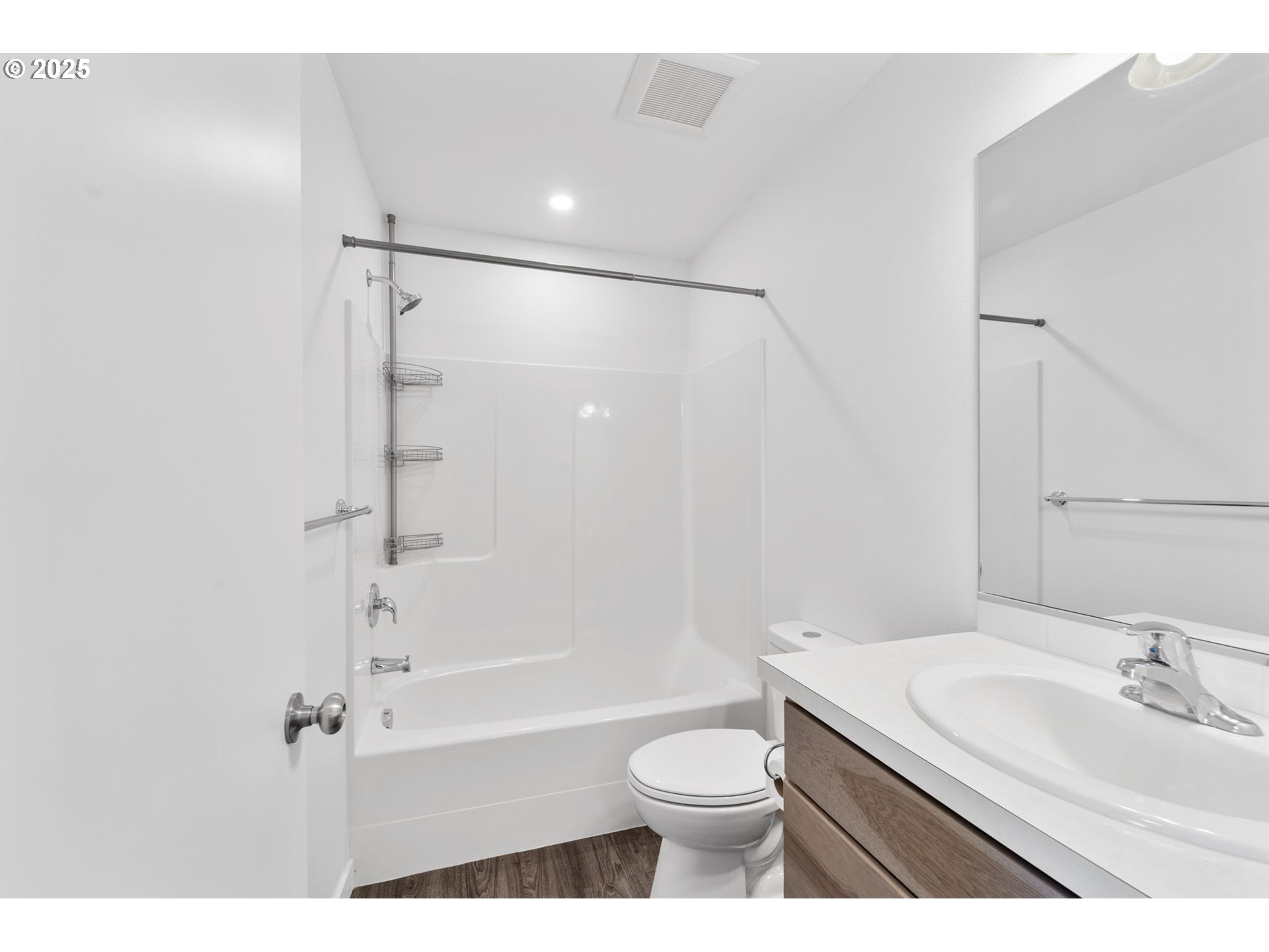 774 Northeast 11th Street Hermiston, OR 97838 - Photo 21 of 34 a bathroom with a granite countertop sink toilet a shower and a mirror