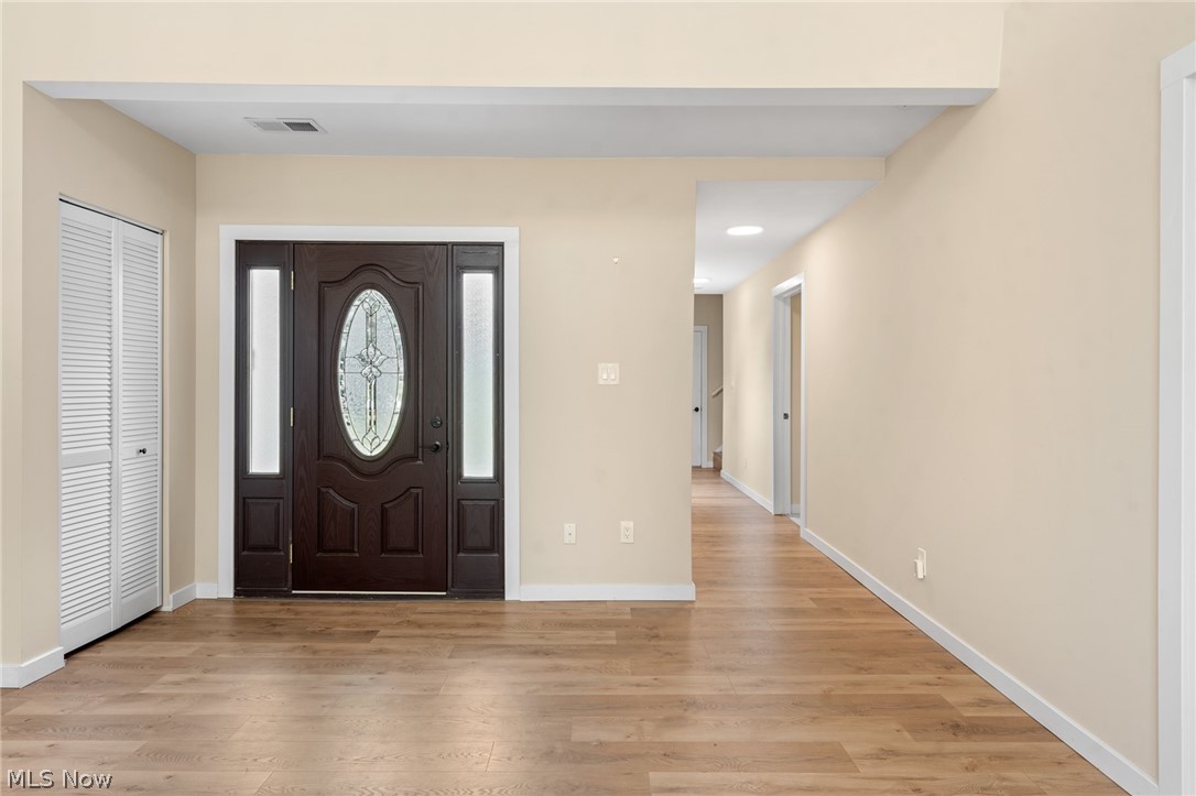 Foyer featuring light hardwood / wood-style flooring