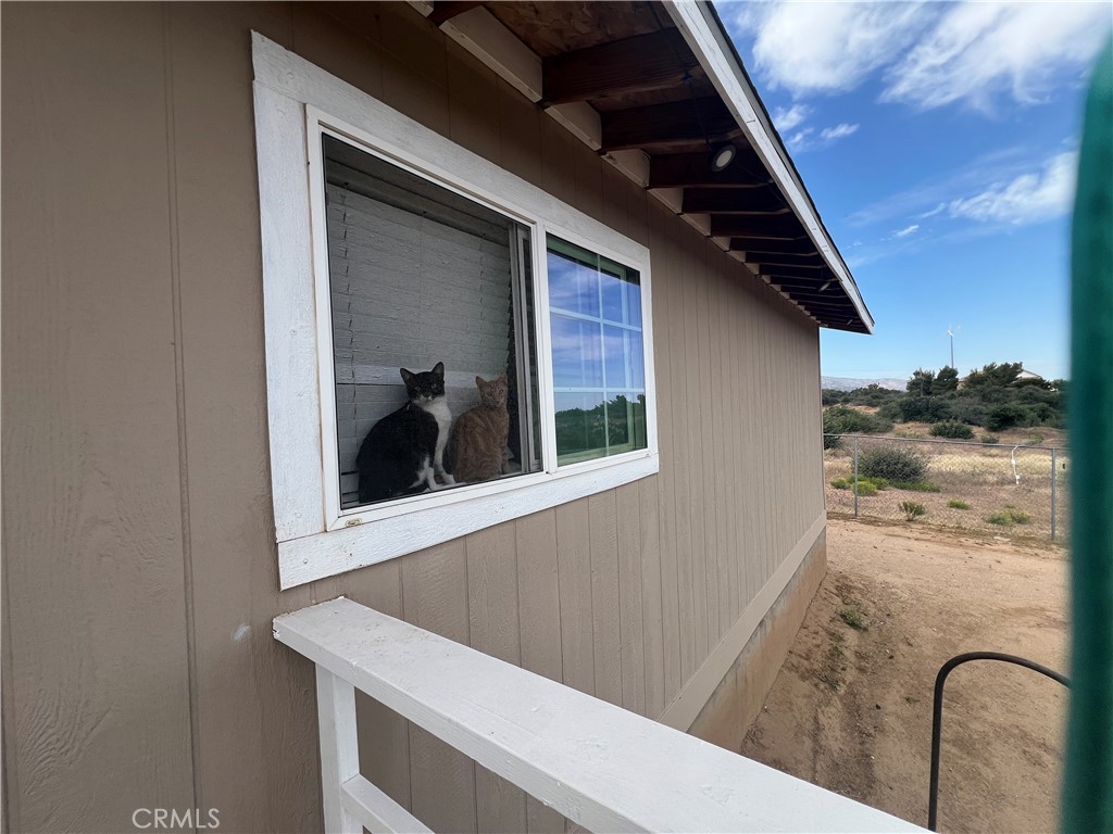 8471 Caughlin Road Phelan, CA 92371 - Photo 12 of 21 a view of swimming pool from a balcony