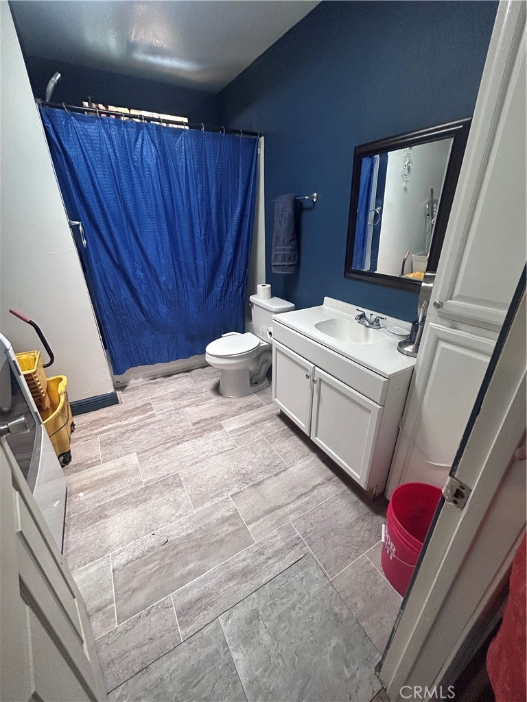 8471 Caughlin Road Phelan, CA 92371 - Photo 16 of 21 a bathroom with a sink a vanity and mirror