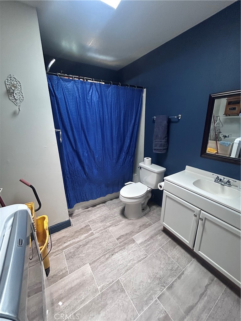 8471 Caughlin Road Phelan, CA 92371 - Photo 18 of 21 a view of bathroom with a sink and mirror