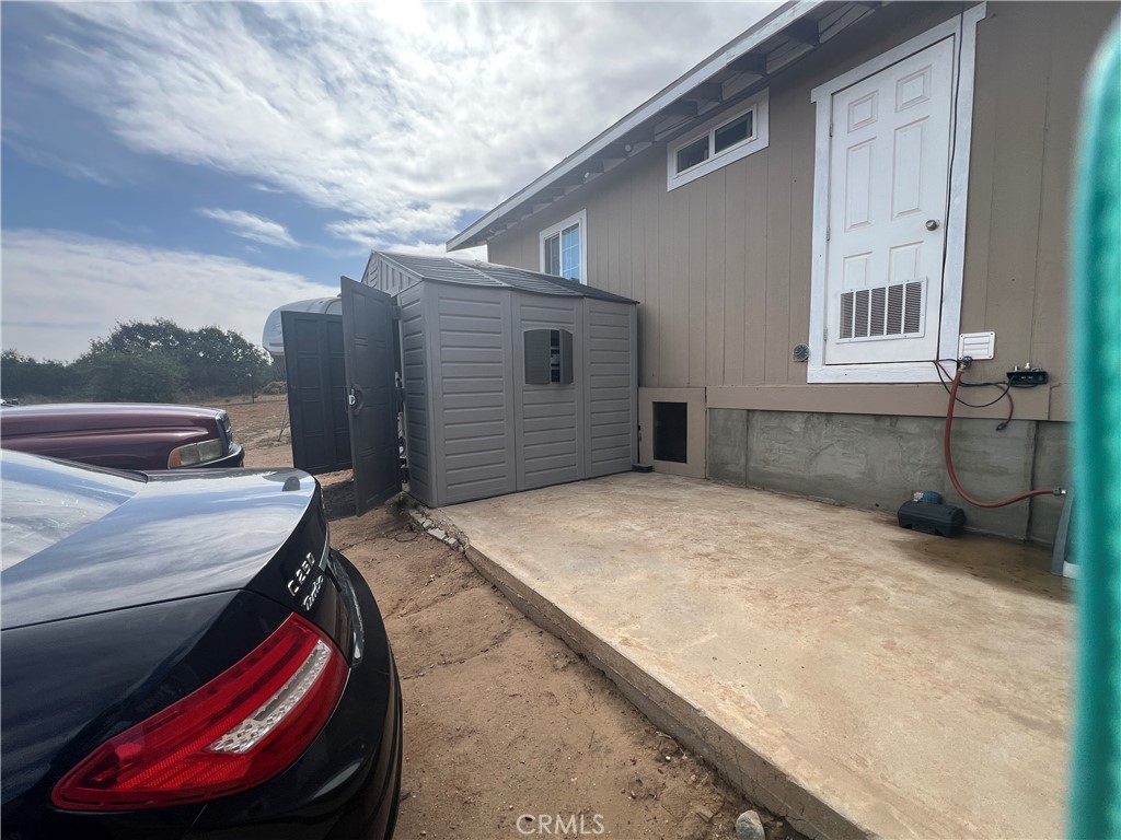 8471 Caughlin Road Phelan, CA 92371 - Photo 8 of 21 a house view with a backyard space