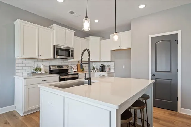 $405,396 | 405 Southwest Redbud Court, Blue Springs, MO 64064