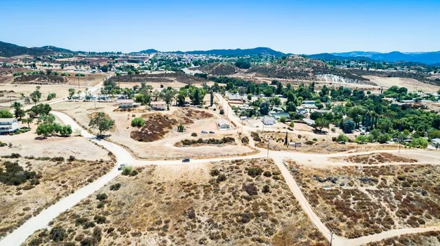 an aerial view of residential building and trees