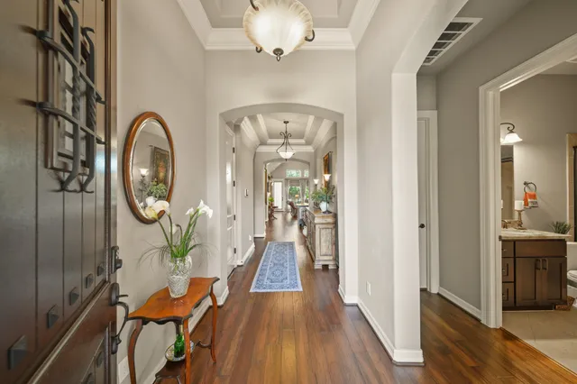 a view of a livingroom with furniture and wooden floor