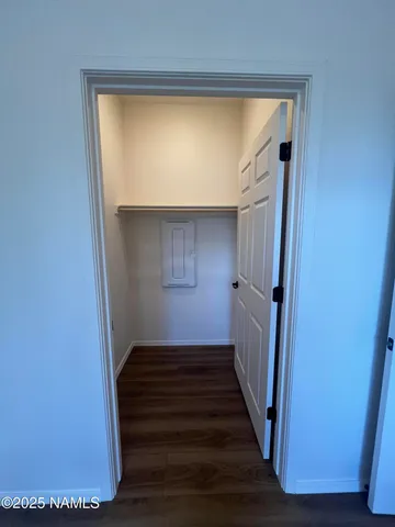 a bathroom with a sink a toilet a shower and a mirror