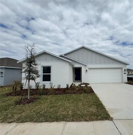 a house view with a garden space