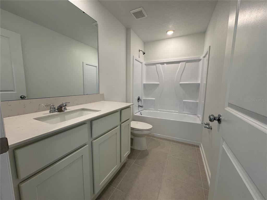 2185 Lasso Loop Eagle Lake, FL 33839 - Photo 6 of 33