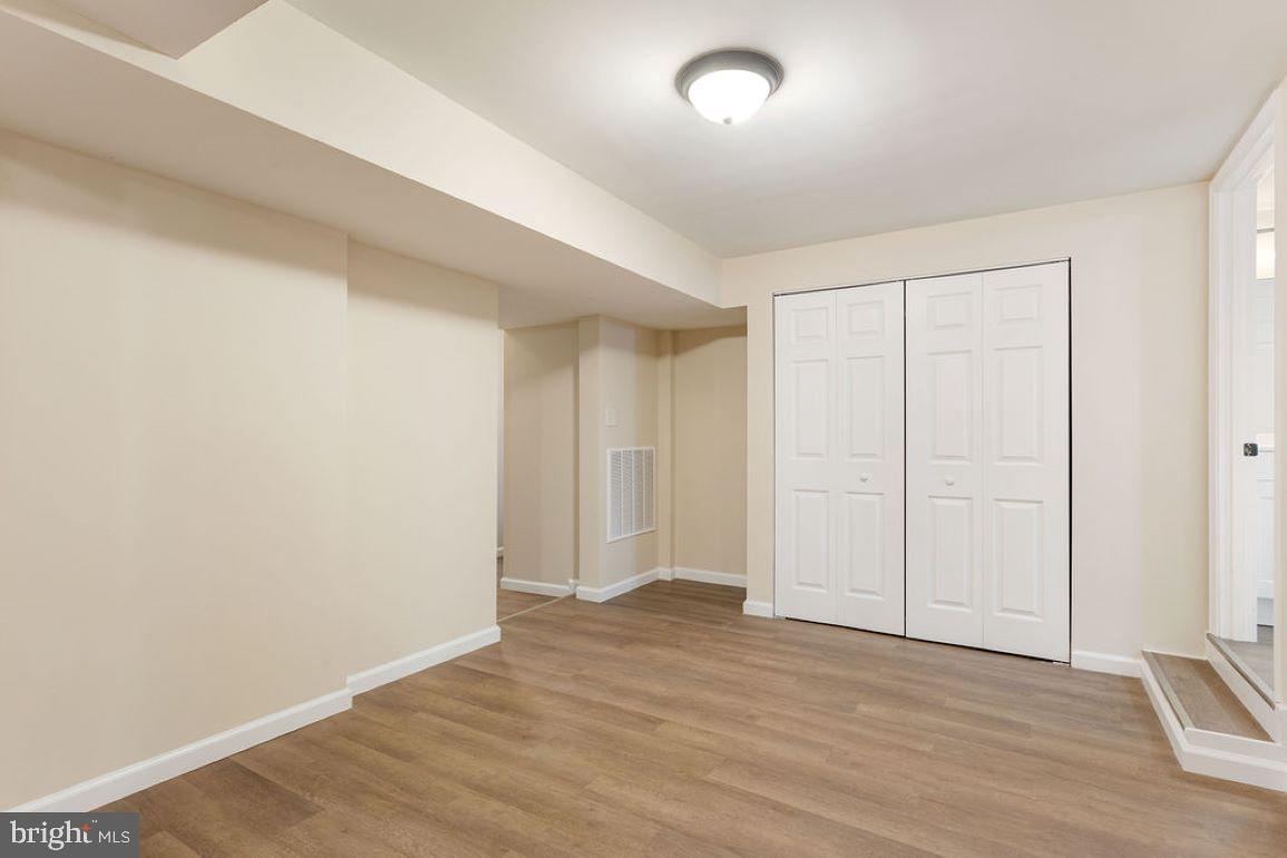 2325 York Road Gettysburg, PA 17325 - Photo 13 of 63 an empty room with wooden floor and closet