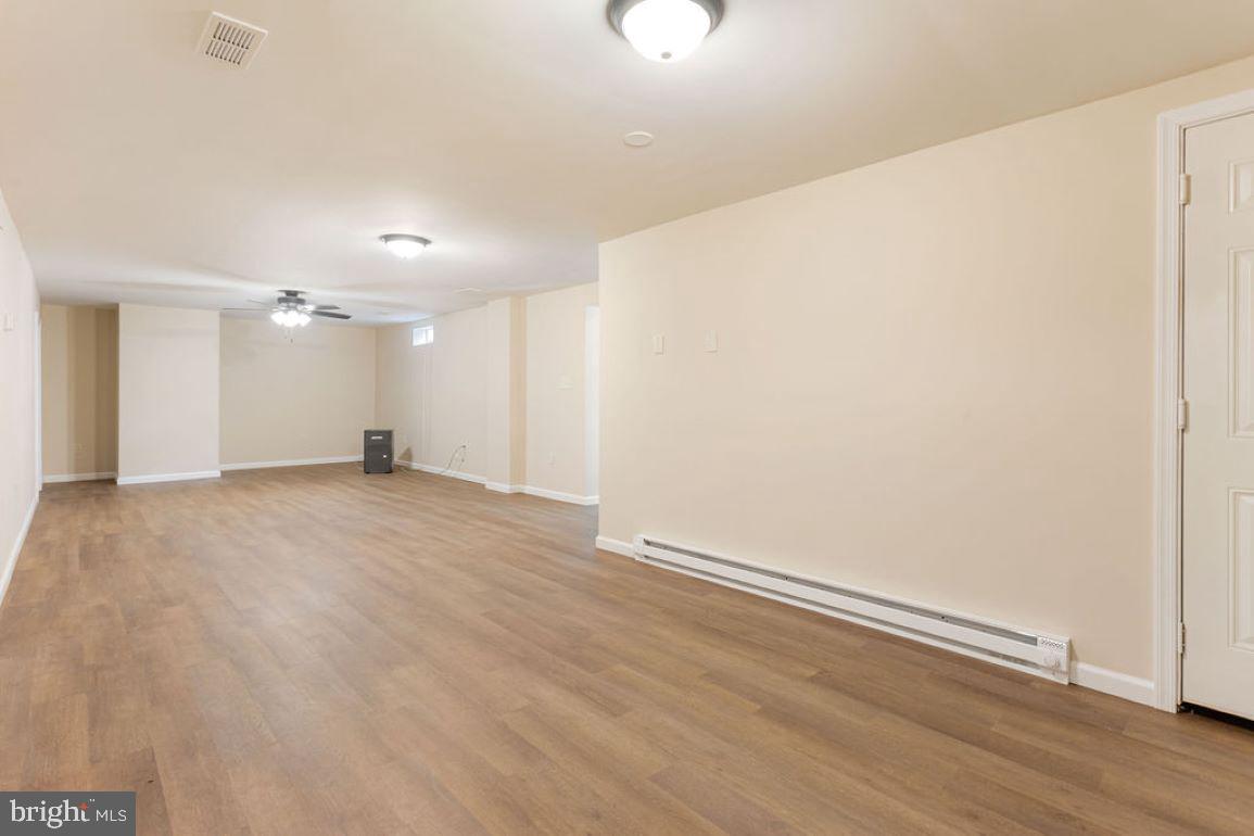 2325 York Road Gettysburg, PA 17325 - Photo 19 of 63 an empty room with wooden floor and windows