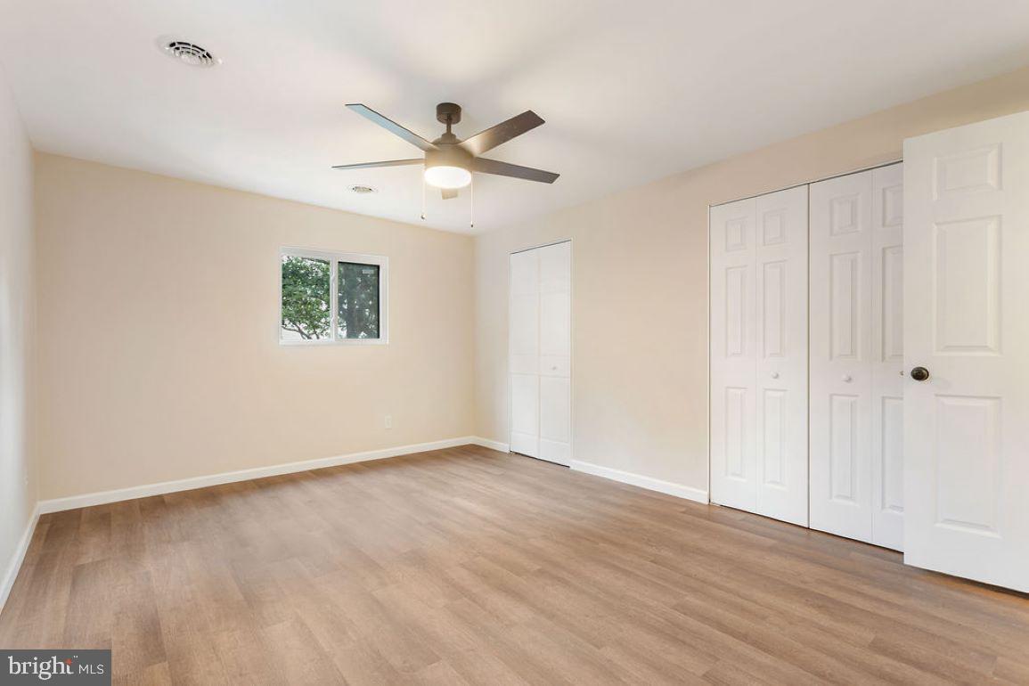 2325 York Road Gettysburg, PA 17325 - Photo 35 of 63 a view of an empty room with wooden floor and a ceiling fan