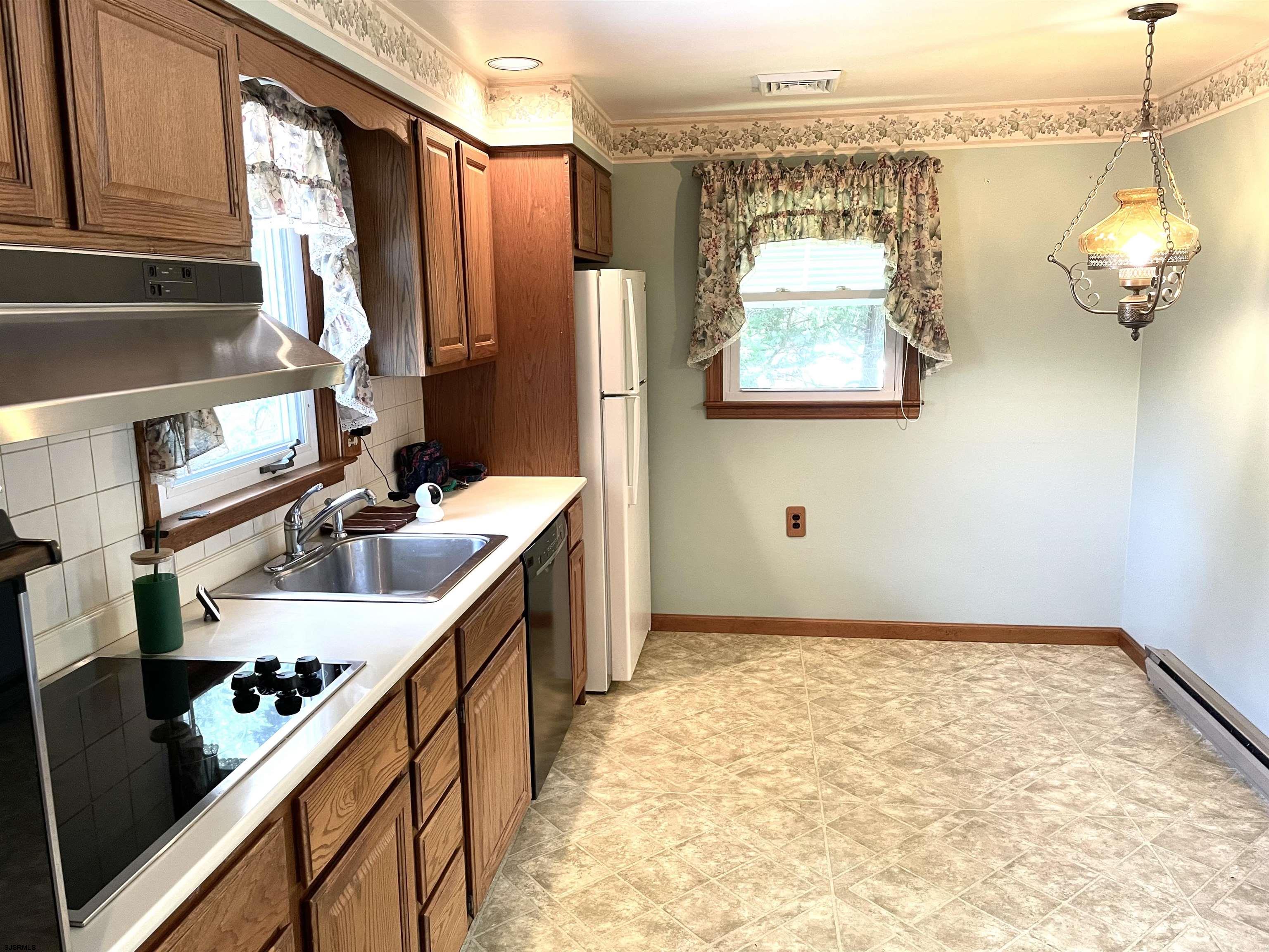 183 Chestnut Neck Road Port Republic, NJ 08241 - Photo 5 of 21 a view of kitchen with furniture and window