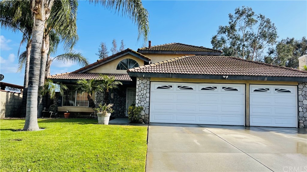 6870 Condor Drive Riverside, CA 92509 - Photo 1 of 1 a front view of a house with garden