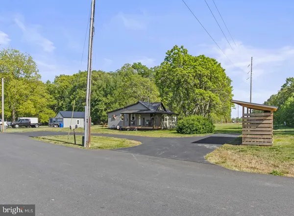 a view of a house with a park