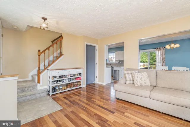 a living room with furniture and a table