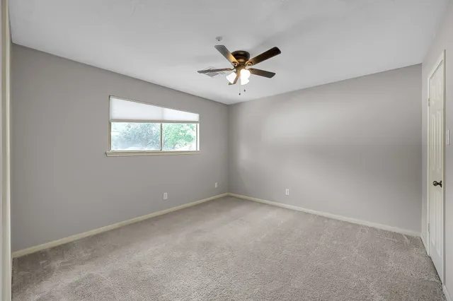 a bathroom with a shower sink double and mirror