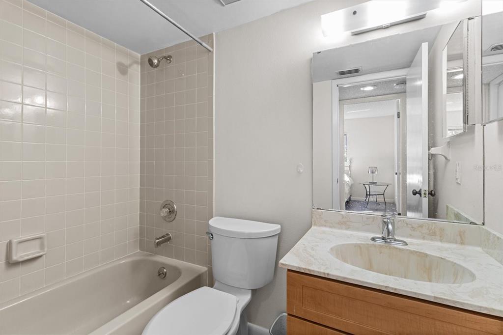 2851 Southwest 32nd Avenue, Unit B6 Ocala, FL 34474 - Photo 24 of 31 a bathroom with a sink toilet and shower