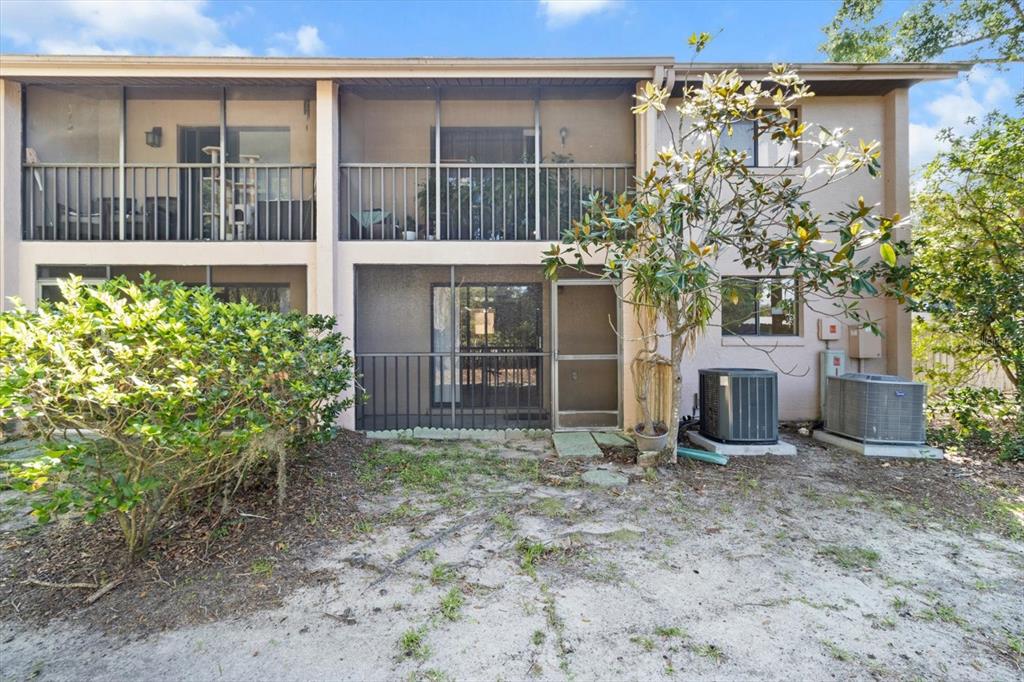 2851 Southwest 32nd Avenue, Unit B6 Ocala, FL 34474 - Photo 28 of 31 front view of a house with a yard