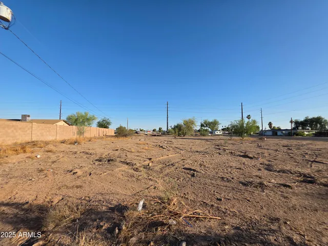 a view of a backyard of the house