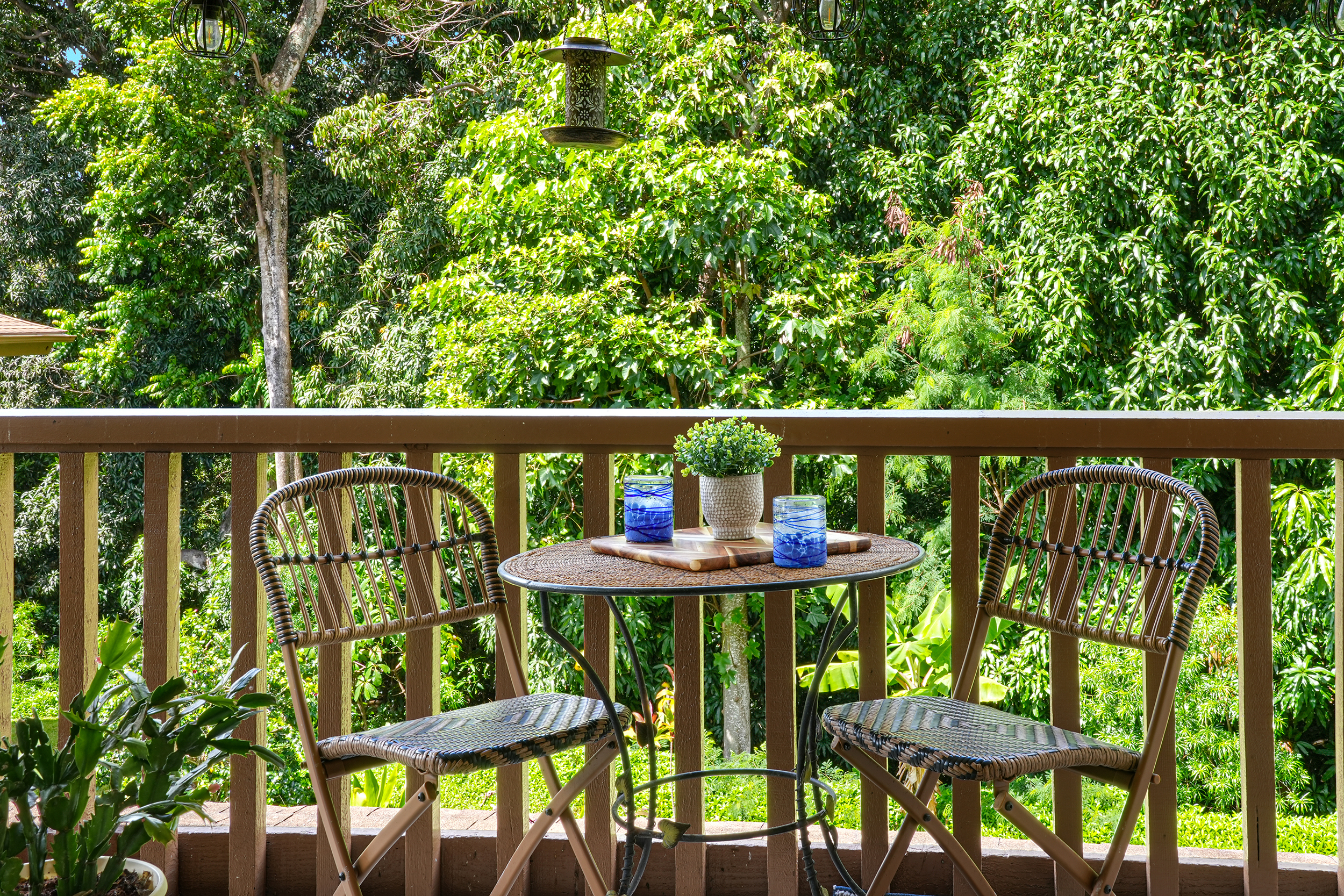 4701 Kawaihau Road, Unit F201 Kapaa, HI 96746 - Photo 4 of 11 a view of a chair and table in the balcony