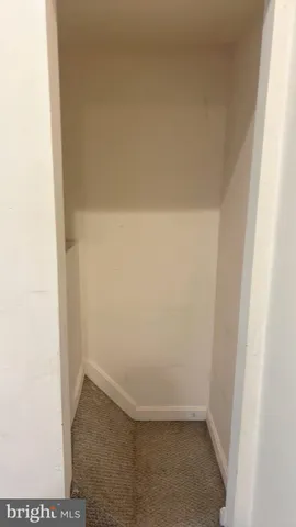 a view of small space with racks on the wall